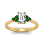 Load image into Gallery viewer, petite-cathedral-emerald-cut-diamond-engagement-ring-with-emerald-in-yellow-gold-FD9275EMRGEMGRANGLE5-NL-YG_e906d249-3cea-4f0c-a0f0-a4b080b12505?v=1758264056
