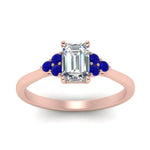 Load image into Gallery viewer, petite-cathedral-emerald-cut-diamond-engagement-ring-with-sapphire-in-rose-gold-FD9275EMRGSABLANGLE5-NL-RG_12c831b6-b9ab-4209-8cb7-9eb40af883f2?v=1758264056
