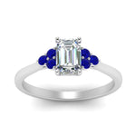 Load image into Gallery viewer, petite-cathedral-emerald-cut-diamond-engagement-ring-with-sapphire-in-white-gold-FD9275EMRGSABLANGLE5-NL-WG_e1c6718c-8f0f-43d2-9474-25b3054e3b1d?v=1758264056
