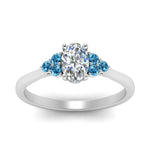 Load image into Gallery viewer, petite-cathedral-oval-shaped-diamond-engagement-ring-with-blue-topaz-in-white-gold-FD9275OVRGICBLTOANGLE5-NL-WG_894e863b-767e-4d39-a984-7d1c18336d43?v=1758264078
