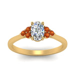 Load image into Gallery viewer, petite-cathedral-oval-shaped-diamond-engagement-ring-with-orange-sapphire-in-yellow-gold-FD9275OVRGSAORANGLE5-NL-YG_589c20eb-8625-44b9-bf4b-21abaab4882b?v=1758264077
