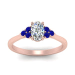 Load image into Gallery viewer, petite-cathedral-oval-shaped-diamond-engagement-ring-with-sapphire-in-rose-gold-FD9275OVRGSABLANGLE5-NL-RG_71af909a-8bf0-4771-a905-a18c6427c30e?v=1758264078
