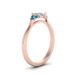 Load image into Gallery viewer, petite-cathedral-pear-shaped-diamond-engagement-ring-with-blue-topaz-in-rose-gold-FD9275PERGICBLTOANGLE2-NL-RG_813f8bbe-138f-4fae-b87e-a5317849690b?v=1758264089
