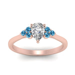 Load image into Gallery viewer, petite-cathedral-pear-shaped-diamond-engagement-ring-with-blue-topaz-in-rose-gold-FD9275PERGICBLTOANGLE5-NL-RG_58b5f7ee-368a-4be2-b8a8-fac6db3b34ab?v=1758264089
