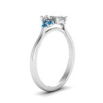 Load image into Gallery viewer, petite-cathedral-radiant-cut-diamond-engagement-ring-with-blue-topaz-in-white-gold-FD9275RARGICBLTOANGLE2-NL-WG?v=1758264005
