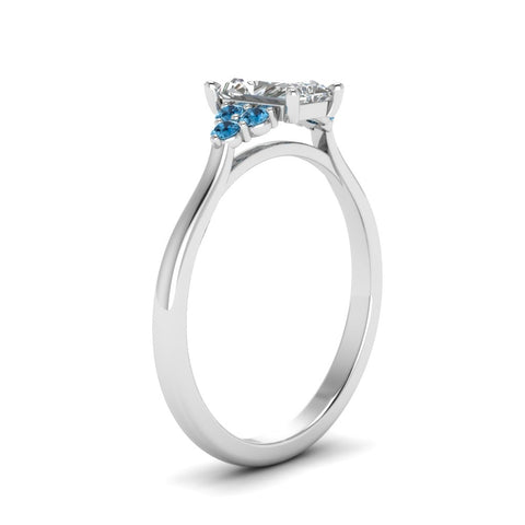 petite-cathedral-radiant-cut-diamond-engagement-ring-with-blue-topaz-in-white-gold-FD9275RARGICBLTOANGLE2-NL-WG?v=1758264005