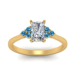 Load image into Gallery viewer, petite-cathedral-radiant-cut-diamond-engagement-ring-with-blue-topaz-in-yellow-gold-FD9275RARGICBLTOANGLE5-NL-YG_b6f5195b-f9bd-4f25-95d1-0596ff1ed00c?v=1758264110
