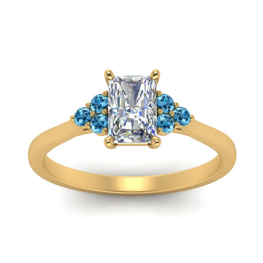petite-cathedral-radiant-cut-diamond-engagement-ring-with-blue-topaz-in-yellow-gold-FD9275RARGICBLTOANGLE5-NL-YG_b6f5195b-f9bd-4f25-95d1-0596ff1ed00c?v=1758264110