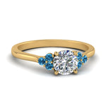Load image into Gallery viewer, petite-cathedral-round-cut-diamond-engagement-ring-with-blue-topaz-in-yellow-gold-FD-9275RORGICBLTO-NL-YG?v=1758264022
