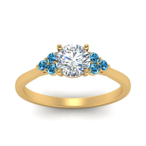 petite-cathedral-round-cut-diamond-engagement-ring-with-blue-topaz-in-yellow-gold-FD-9275RORGICBLTOANGLE5-NL-YG_573645ea-76b9-4016-bf99-53ef1bc5ab42?v=1758264121