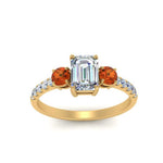 Load image into Gallery viewer, petite-micropave-emerald-cut-three-stone-diamond-engagement-ring-with-orange-sapphire-in-yellow-gold-FD9383EMRGSAOR-NL-YG
