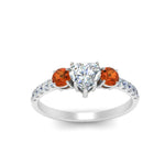 Load image into Gallery viewer, petite-micropave-heart-shaped-three-stone-diamond-engagement-ring-with-orange-sapphire-in-white-gold-FD9383HTRGSAOR-NL-WG