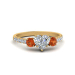 Load image into Gallery viewer, petite-micropave-heart-shaped-three-stone-diamond-engagement-ring-with-orange-sapphire-in-yellow-gold-FD9383HTRGSAOR-NL-YG