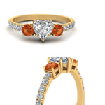 Load image into Gallery viewer, petite-micropave-heart-shaped-three-stone-diamond-engagement-ring-with-orange-sapphire-in-yellow-gold-FD9383HTRGSAOR-NL-YG