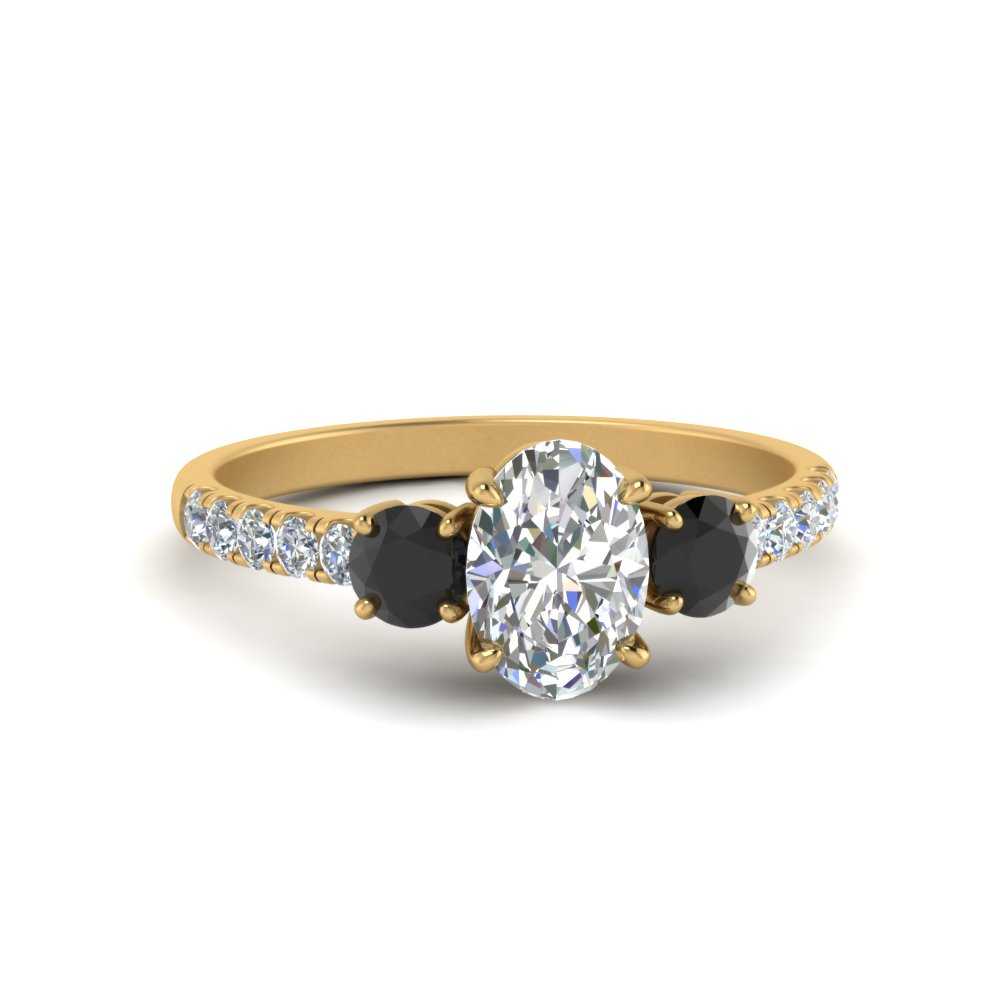 Petite Micropave Three Stone Oval Diamond Ring