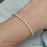 Load and play video in Gallery viewer, 10-ct-lab-diamond-tennis-bracelet-in-18k-yellow-gold-fdbrc8635ro-10-00-ct-2000
