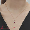 Twisted-pear-shape-diamond-and-ruby-pendant-necklace-in-rose-gold-FDPD11269-720x720