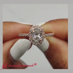 Load and play video in Gallery viewer, Oval Shaped Halo Petite Engagement Ring
