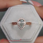 Load and play video in Gallery viewer, hand-engraved-pear-shaped-halo-diamond-engagement-ring-in-rose-gold-FD8588PER
