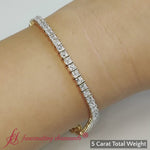 Load and play video in Gallery viewer, 5-ct-princess-diamond-tennis-bracelet-in-yellow-gold-fdbrc10450pr-5-00-ct-2000
