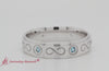 Load and play video in Gallery viewer, bezel-set-blue-topaz-mens-wedding-band-in-white-gold-fddb1284b