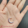 half-moon-necklace-diamond-pendant-with-sapphire-in-white-gold-FDPD9197-Fancyvideo
