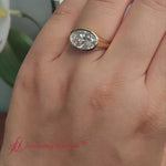 Load and play video in Gallery viewer, east-west-oval-bezel-engagement-ring-lab-diamond--in-yellow-gold-fdenr11606-2000
