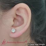 Load and play video in Gallery viewer, round-cut-diamond-stud-earring-2-carat-in-yellow-gold-fdear10411ro-fancyvideo
