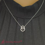 Load and play video in Gallery viewer, double-circle-diamond-necklace-in-white-gold-fdpd10835-fancyvideo