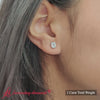 Load and play video in Gallery viewer, Stud Earring Emerald Diamond Bezel
