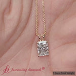 Load and play video in Gallery viewer, 1-ct-radiant-cut-solitaire-necklace-in-yellow-gold-FDPD8469-RA

