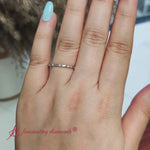 Load and play video in Gallery viewer, thin-space-out-stackable-diamond-band-with-pink-sapphire-in-white-gold-FDEWB9437-720
