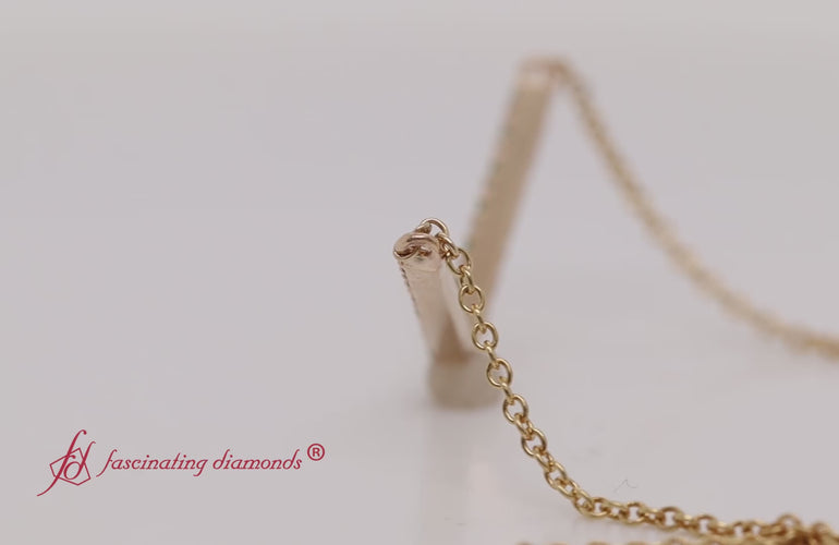 v-shaped-diamond-necklace-with-emerald-in-yellow-gold-fdpd8345-video