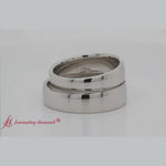Load and play video in Gallery viewer, matching-his-and-her-wedding-bands-for-couples-with-white-diamond-in-white-gold-FD1144B