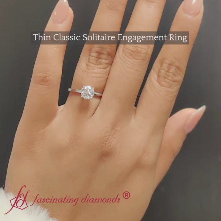round-cut-thin-classic-solitaire-engagement-ring-in-white-gold-fdens9358