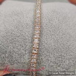 Load and play video in Gallery viewer, 5-ct-princess-diamond-tennis-bracelet-in-yellow-gold-fdbrc10450pr-5-00-ct