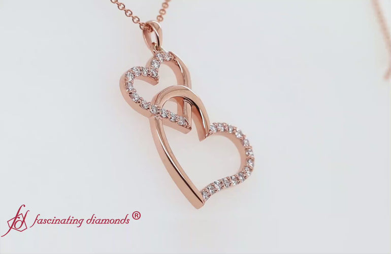 double-heart-diamond-pendant-with-pink-sapphire-in-14k-rose-gold-fdpd328
