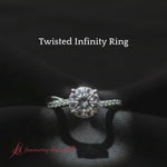 Load and play video in Gallery viewer, round-cut-twisted-infinity-vine-engagement-ring-in-white-gold-fdens8253r-model-640
