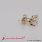 Load and play video in Gallery viewer, round-cut-diamond-stud-earring-2-carat-in-yellow-gold-fdear10411ro-video1
