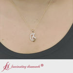 Load and play video in Gallery viewer, baby-foot-diamond-pendant-in-yellow-gold-fdpd9367-fancyvideo
