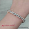tennis-bracelet-basket-set-emerald-cut-20-carat-in-14k-yellow-gold-fdbrc10449em-20.00c