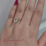 Load and play video in Gallery viewer, Oval Cut Bezel Set Diamond Solitaire Engagement Ring