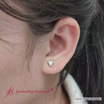 Load and play video in Gallery viewer, Heart Shaped 3 Prong Basket Stud Earring
