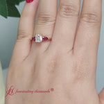 Load and play video in Gallery viewer, pear-3-stone-cushion-cut-cathedral-ring-with-ruby-in-14k-rose-gold-fdenr9210