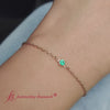 Load and play video in Gallery viewer, bezel-set-single-chain-emerald-bracelet-in-14k-rose-gold-fdbr9169