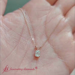 Load and play video in Gallery viewer, emerald-cut-diamond-solitaire-pendant-0.50-carat-in-white-gold-fdpd8469em-0.50-ct
