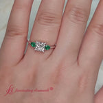 Load and play video in Gallery viewer, pear-diamond-cathedral-princess-cut-engagement-ring-with-emerald-in-white-gold-fdenr9210pr
