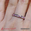 Load and play video in Gallery viewer, round-channel-set-eternity-band-with-pink-sapphire-in-white-gold-fdewb158gsadrpisleep-nl-wg-720