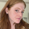 Load and play video in Gallery viewer, half-carat-graduated-huggies-hoop-earring-in-platinum-fdear11729angle1-720