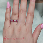 Load and play video in Gallery viewer, 4-carat-heart-eternity-diamond-anniversary-band-with-ruby-in-white-gold-FDEWB8439
